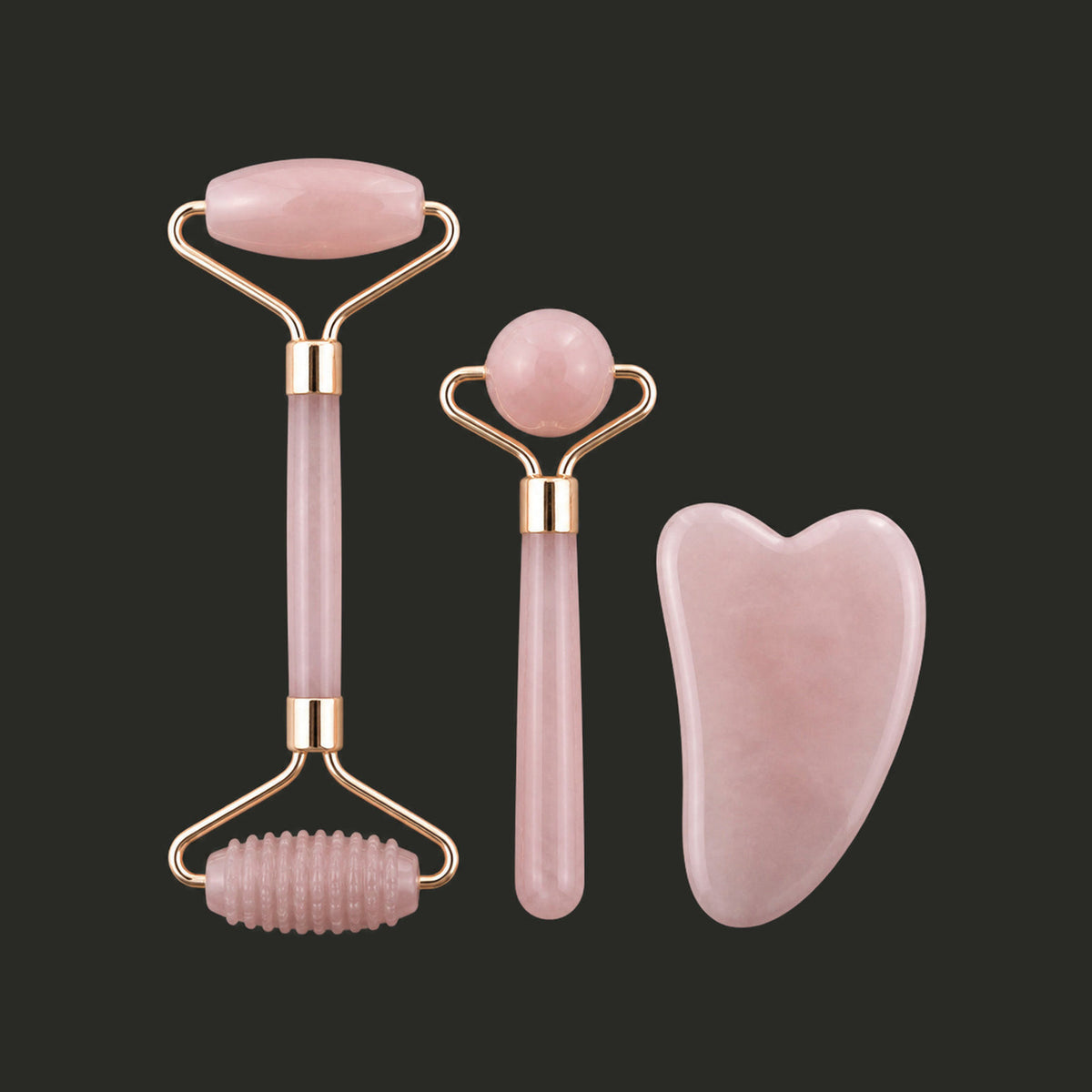 Stone Facial Gift Set, close-up of jade tools on dark background